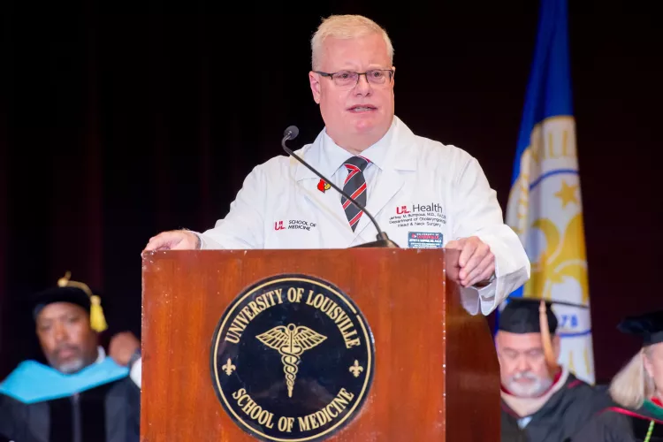 Jeffrey Bumpous addressing the crowd at the white coat ceremony.