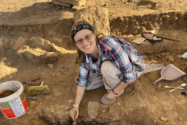 Woman at archaeological dig