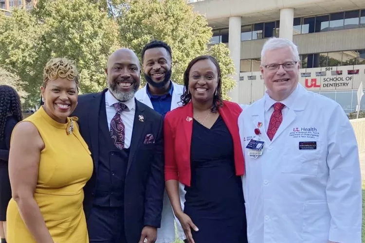 A group of administrators at the Central High School White Coat Ceremony for pre-med magnet students