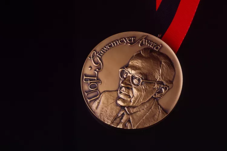 Grawemeyer Awards medal on black background