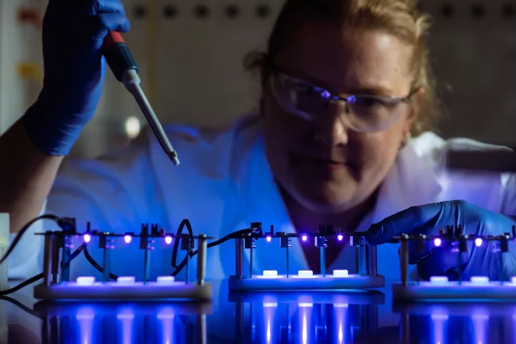 Debbie Yoder-Himes in a laboratory