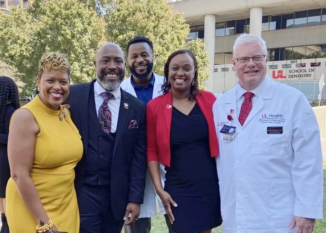 A group of administrators at the Central High School White Coat Ceremony for pre-med magnet students