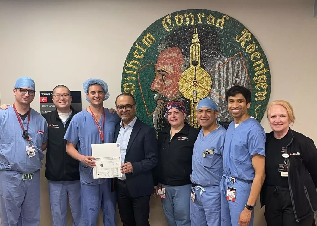 Group of people in hospital scrubs