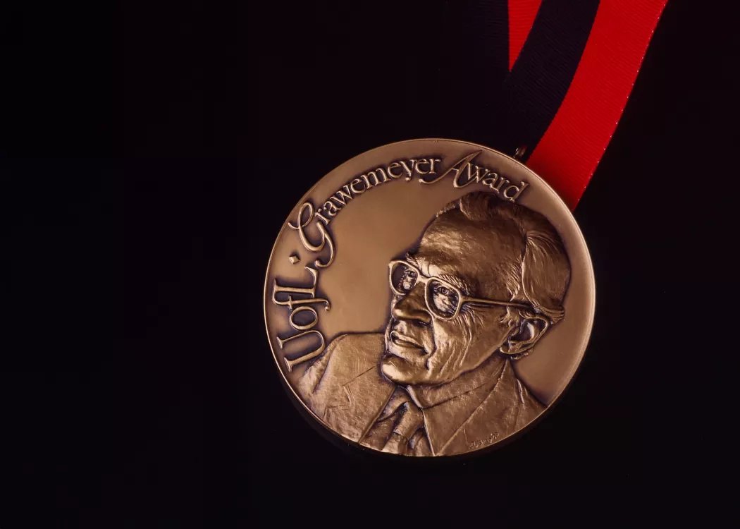 Grawemeyer Awards medal on black background