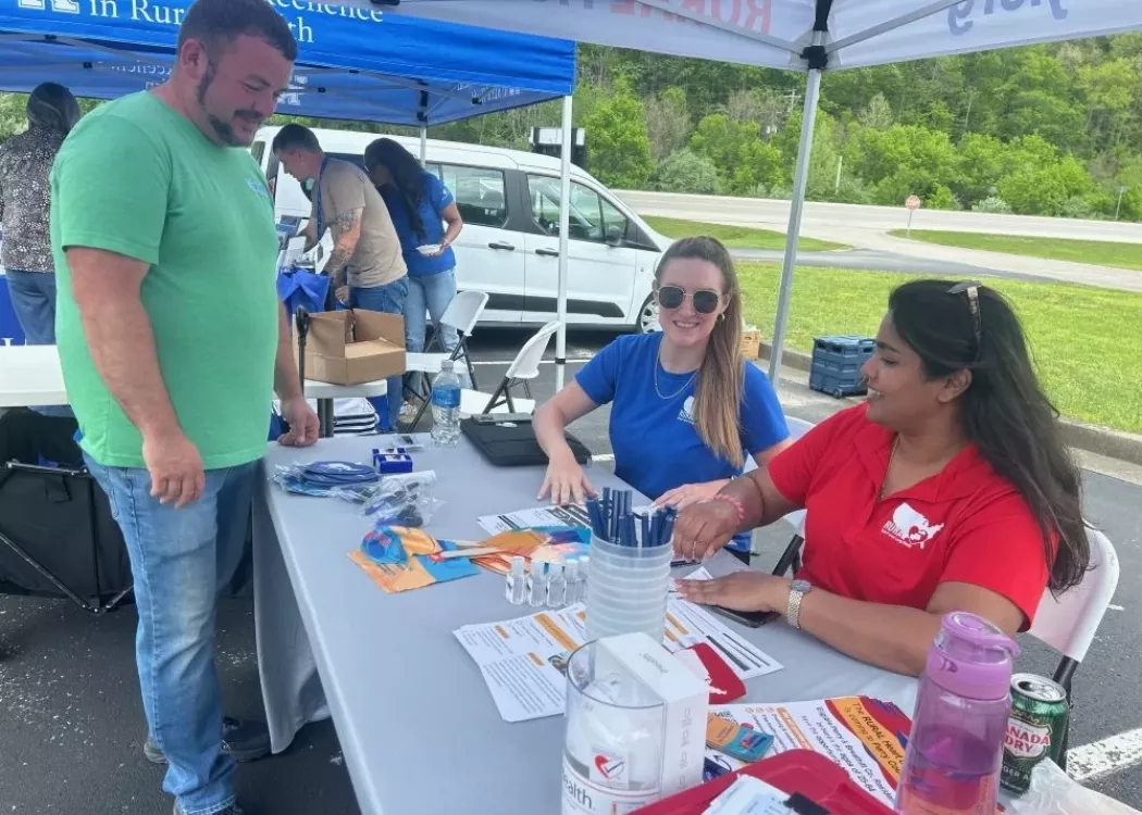 Stephie Abraham connects with residents in a Kentucky community as part of the RURAL study.