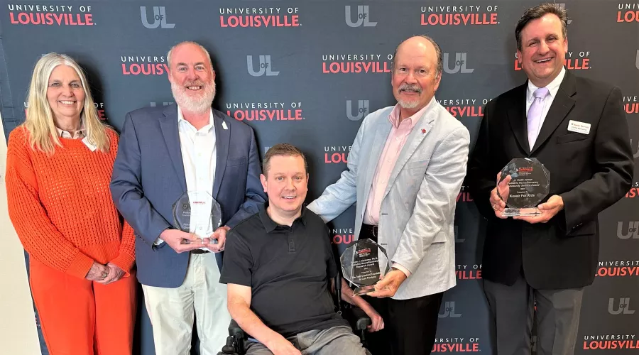 UofL's Kosair for Kids Center for Pediatric NeuroRecovery presented awards to community organizations in May. Left to right: Susan Harkema, Hal Hedley, Todd Crawford, Keith Inman and Chris Williams.