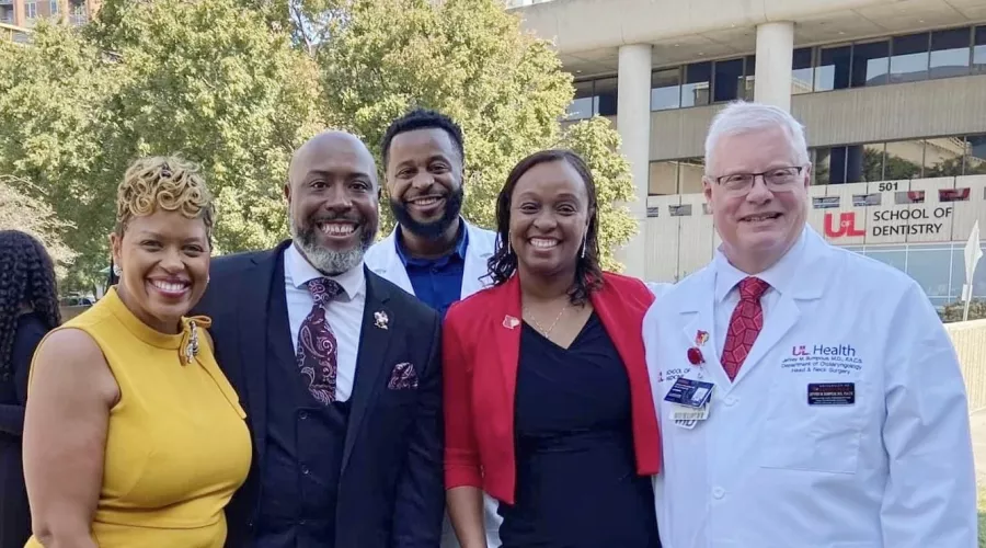A group of administrators at the Central High School White Coat Ceremony for pre-med magnet students
