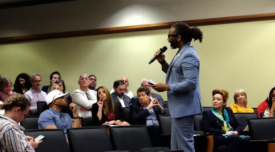 Man talking to an audience.