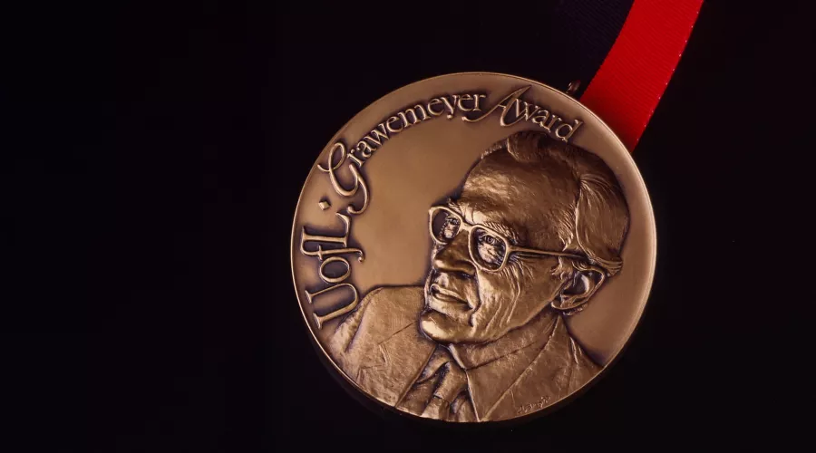 Grawemeyer Awards medal on black background